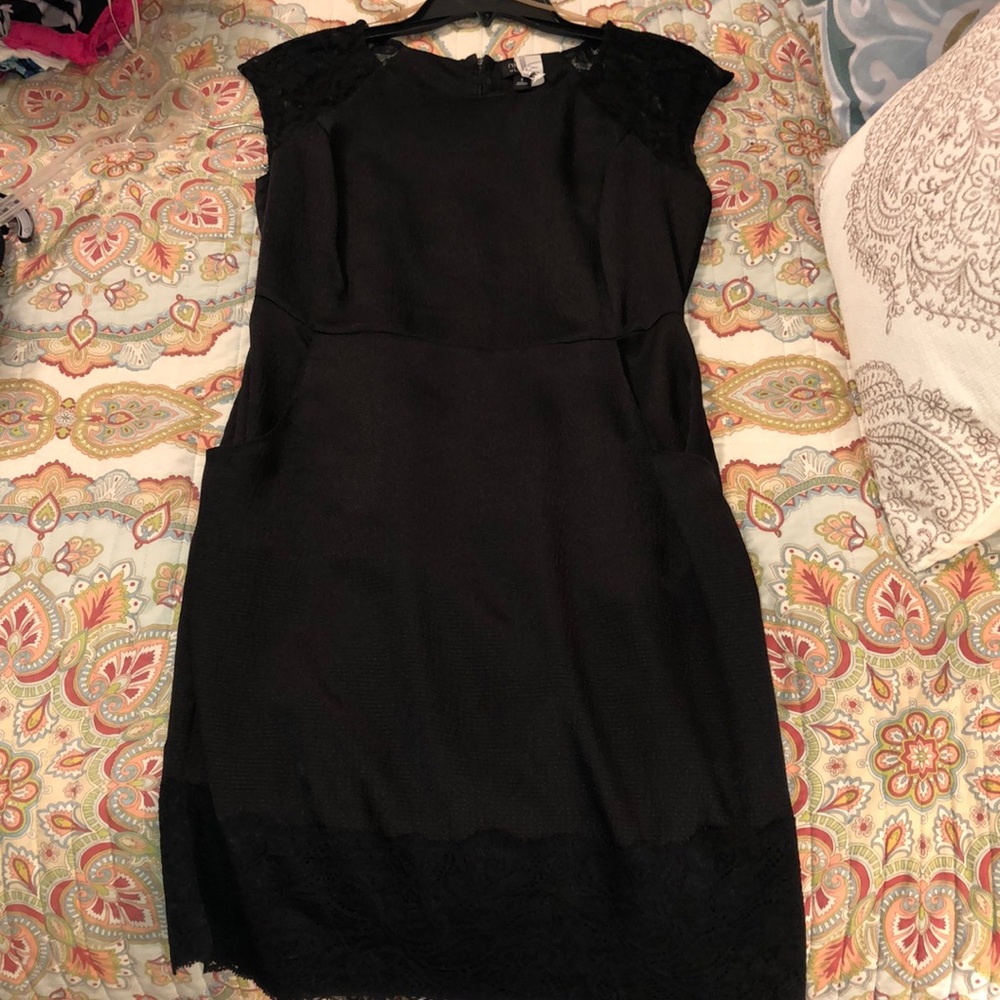 Black knee length with pockets and lace shoulders